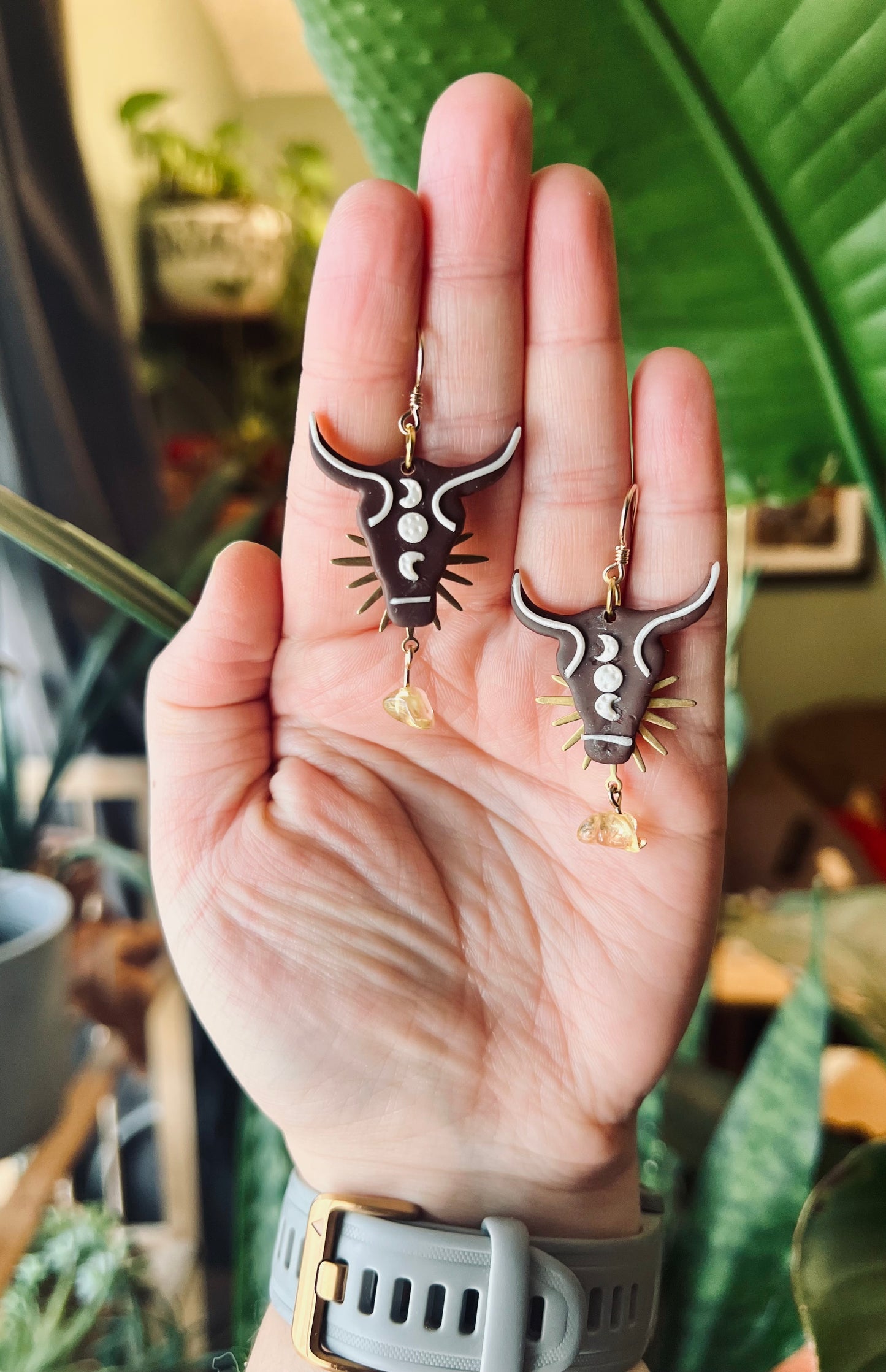 Stunning polymer clay Taurus earrings featuring vibrant citrine gemstones. Handcrafted with care, these earrings embody the steadfast and indulgent nature of Taurus while harnessing the joyful energy of citrine. Elevate your style with this unique blend of artistry and gemstone energy. Shop now and embrace your Taurus identity!