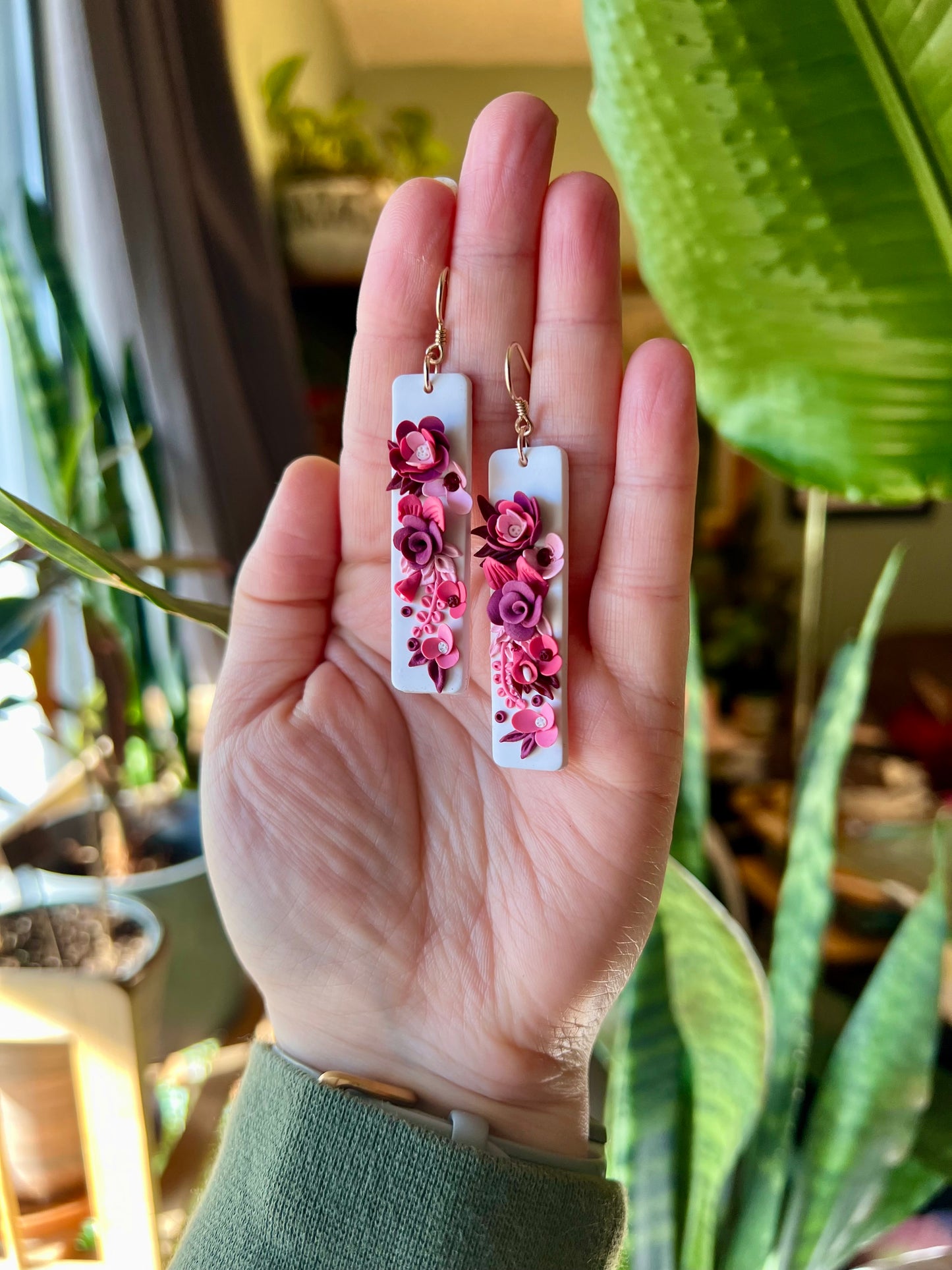 Each pink petal is delicately handcrafted out of polymer clay. These earrings represent love and the Celtic Goddess Aine.