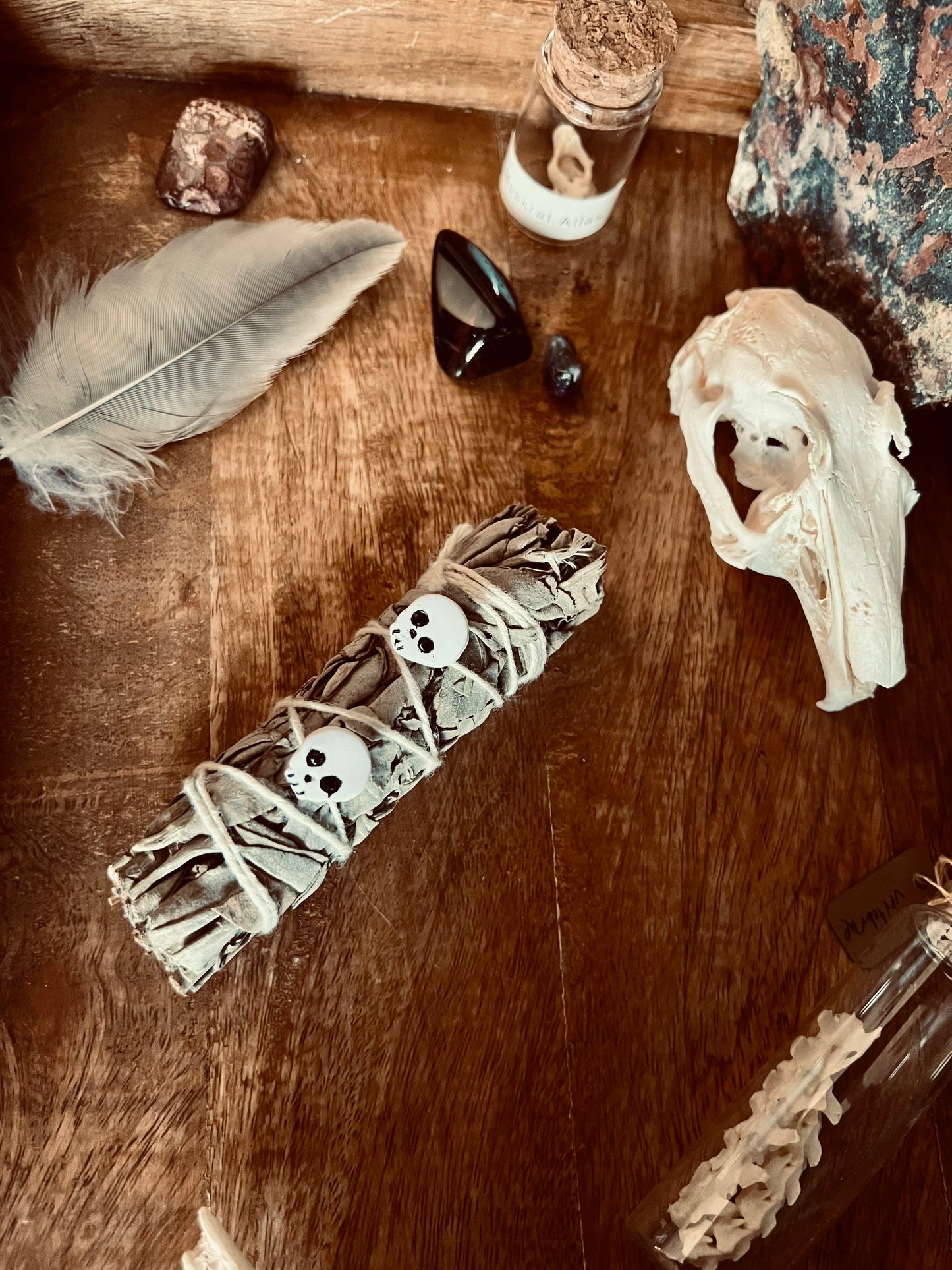 Capture the allure of mysticism with our small white skull earrings, invoking whispers of ancient wisdom.