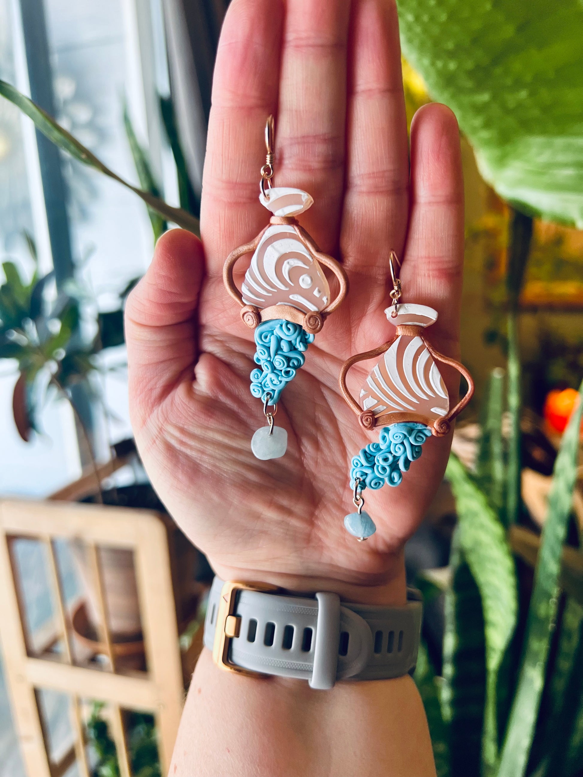 Chic polymer clay Aquarius earrings, handcrafted in Denver, Colorado. Celebrate your Aquarian spirit with these locally made earrings, each piece infused with the artistic energy of the Rockies. Elevate your style with unique, artisanal jewelry. Shop now and embrace your individuality as an Aquarius!
