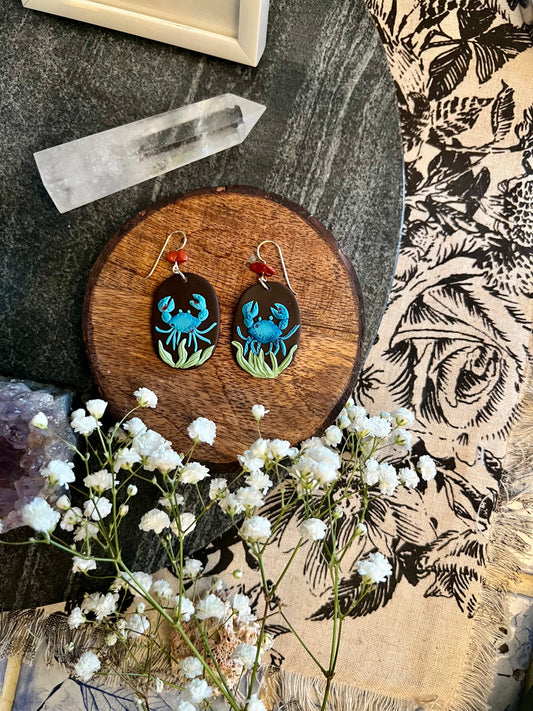 Captivating polymer clay Cancer earrings, symbolizing the nurturing and intuitive traits of the Cancer zodiac sign. Handcrafted with care, these earrings embody the emotional depth and protective nature associated with Cancerians. Celebrate your sensitivity with this symbolic representation. Shop now and embrace the nurturing spirit of Cancer!