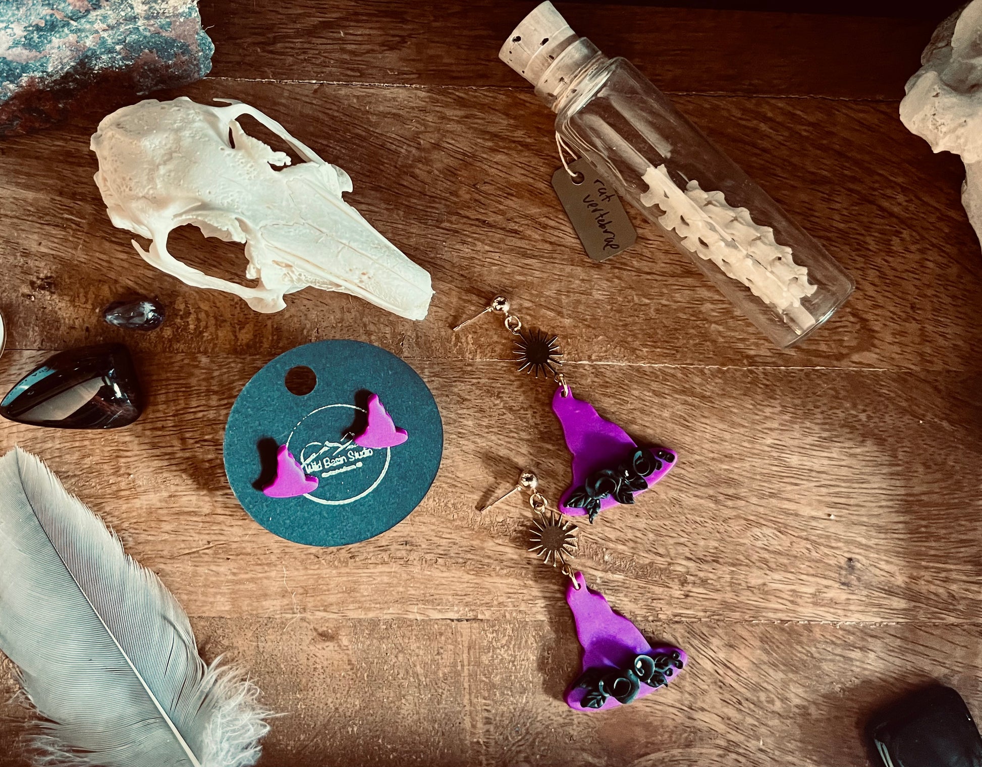 Channel magical prowess with our purple witch hat earrings, adorned with black rose accents and a radiant sun charm. Perfect for those drawn to the mysteries of the occult and the allure of witchy elegance.