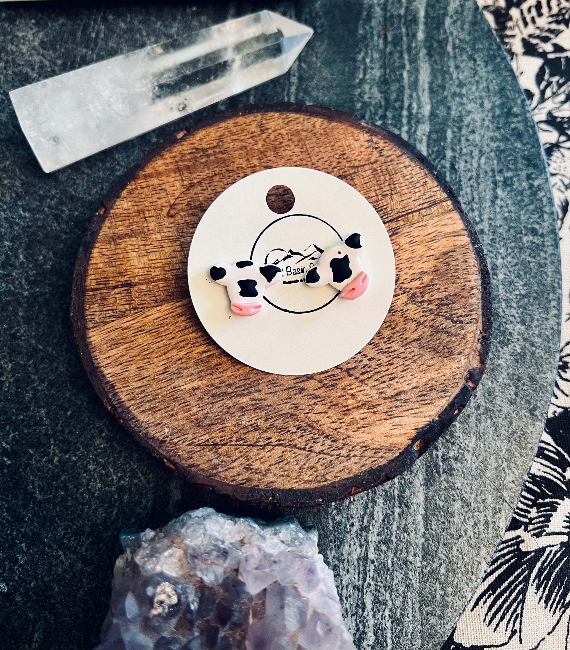 Enhance your western chic look with our farm-inspired cow stud earrings, meticulously handcrafted from polymer clay. These charming accessories add a touch of rustic charm to any outfit, perfect for country lovers and western enthusiasts. Available now!