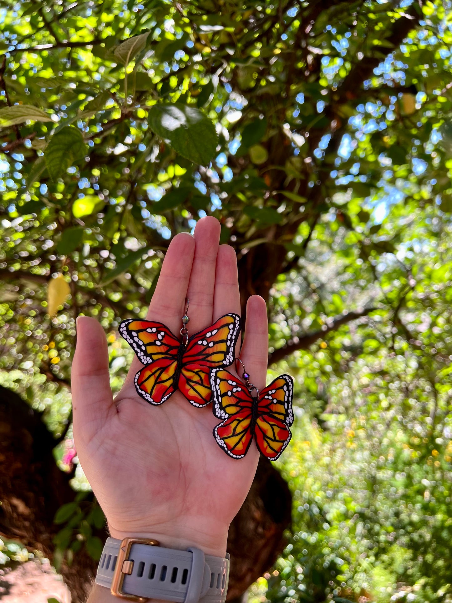 Illuminate your style with our polymer clay earrings inspired by the monarch butterfly. Symbolizing hope and resilience, these earrings are handmade using the intricate Cane technique for a truly unique design.