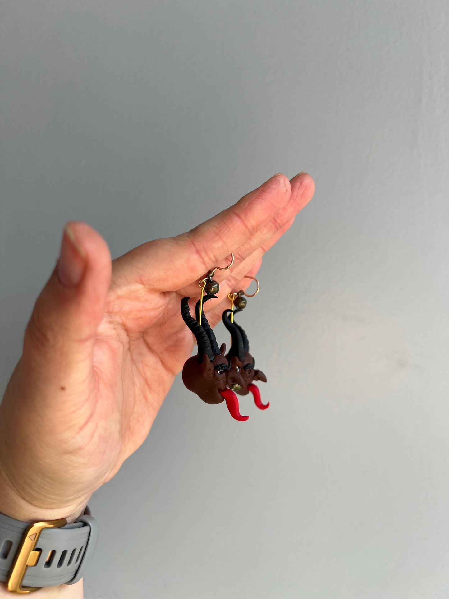 Dare to dance with darkness with our Krampus earrings, boasting hand-sculpted details and eerie bells that add an extra layer of spookiness to your ensemble.