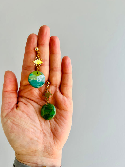 Embrace the symbolism of green with our handmade polymer clay earrings. Representing rebirth and renewal, these earrings harness the earth's energy for growth and balance.