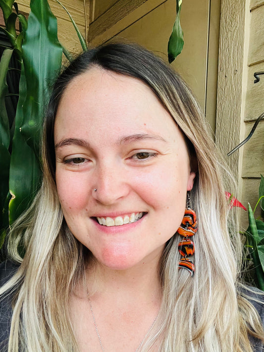 Capture the mesmerizing beauty of the blood moon with our polymer clay earrings. These stunning accessories feature intricate designs reminiscent of the celestial phenomenon, adding a touch of mystique to your look. Embrace the magic of the night sky with our blood moon-inspired earrings!