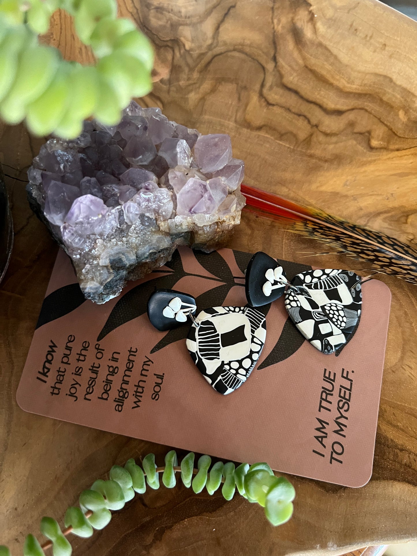 Find solace and peace in the healing power of mushrooms with these polymer clay earrings. In today's hectic world, mushrooms offer a sanctuary for the mind and spirit, promoting mental well-being and tranquility.