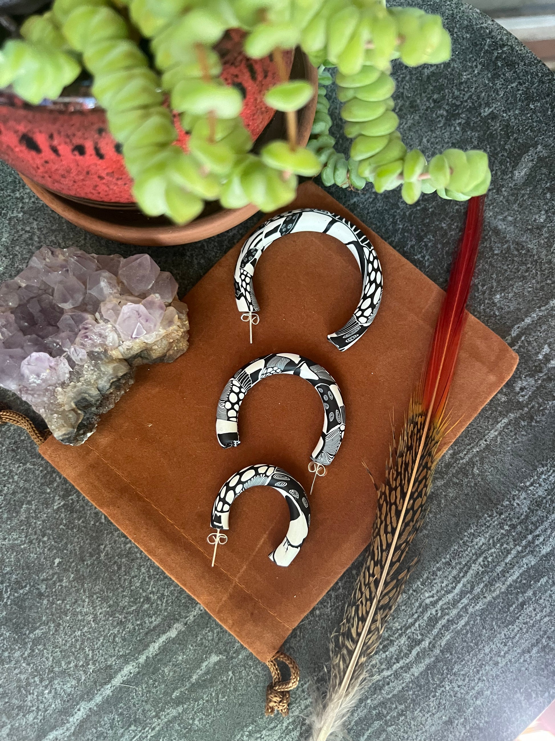 Experience the transformative properties of mushrooms hoop earrings as part of our mushroom earring collection. From ancient times to modern healing practices, mushrooms continue to offer hope and healing for the mind and soul.