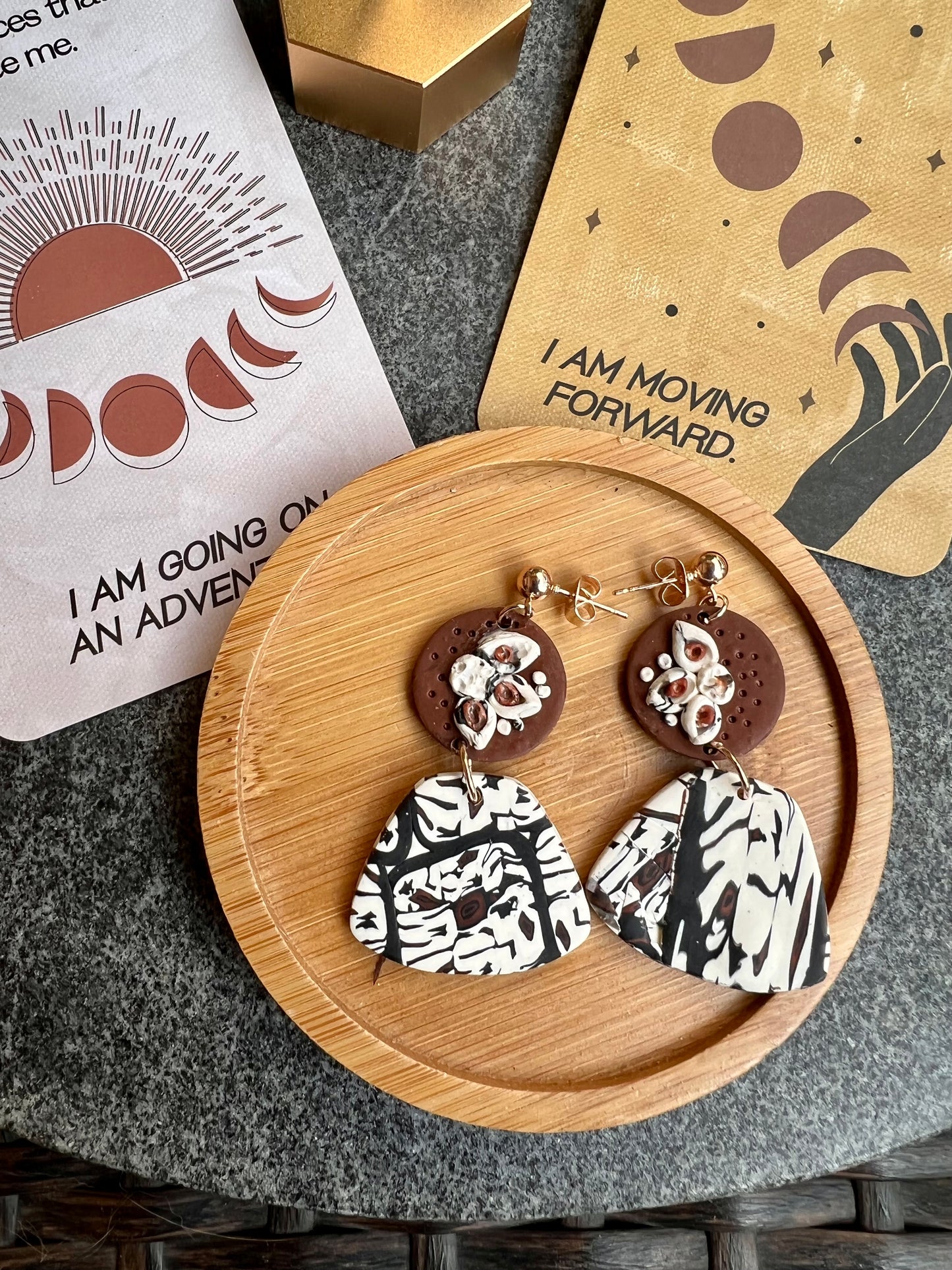 Discover the intricate beauty of polymer clay cane technique in our exquisite jewelry pieces. Each creation showcases the meticulous craftsmanship and vibrant colors achieved through this unique method, each Aspen earring was made using this technique.