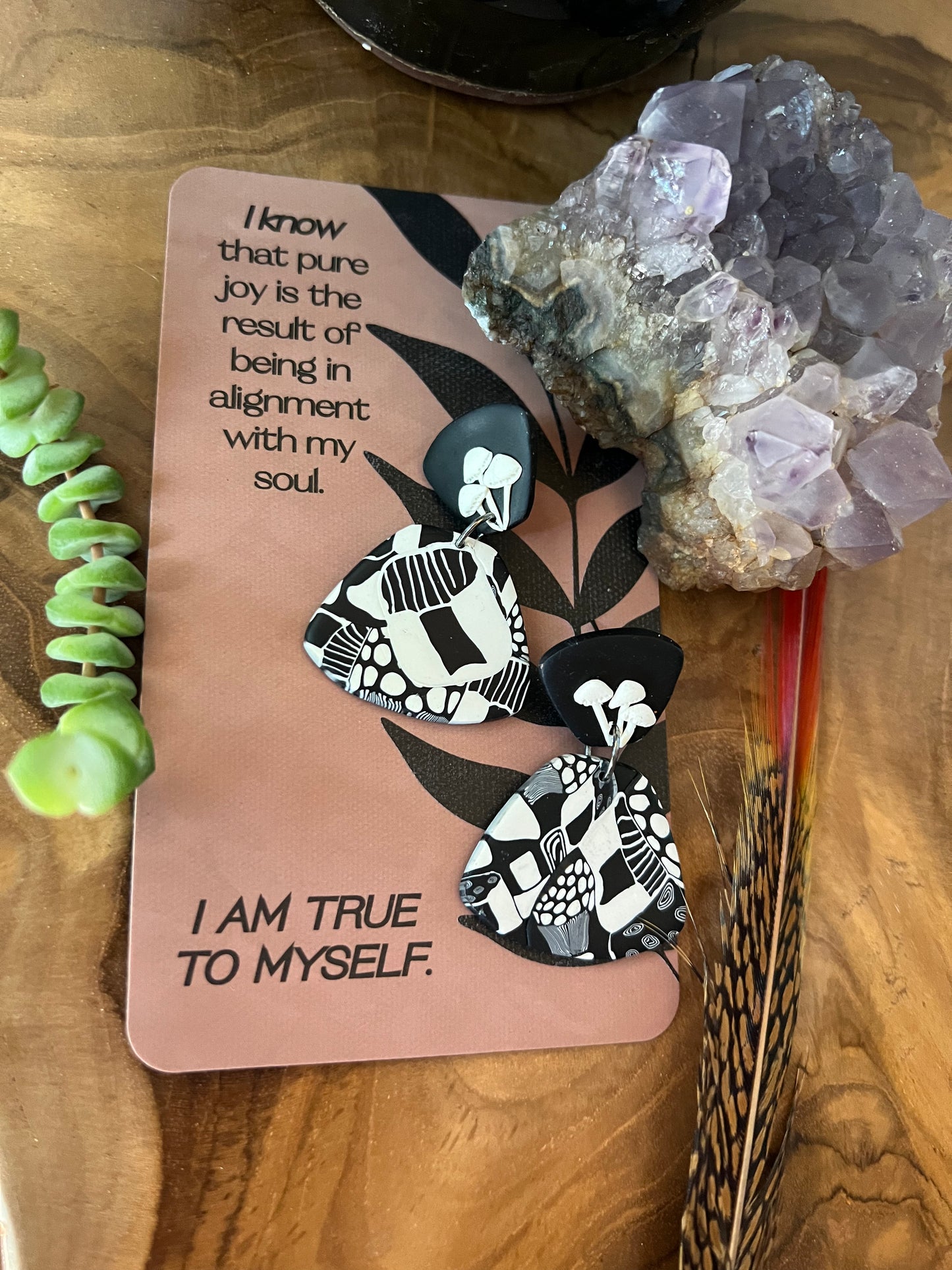 Journey into the realm of mushrooms, believed by many cultures to be portals to the spirit world. Explore our collection and tap into their healing energies with these polymer clay earrings.