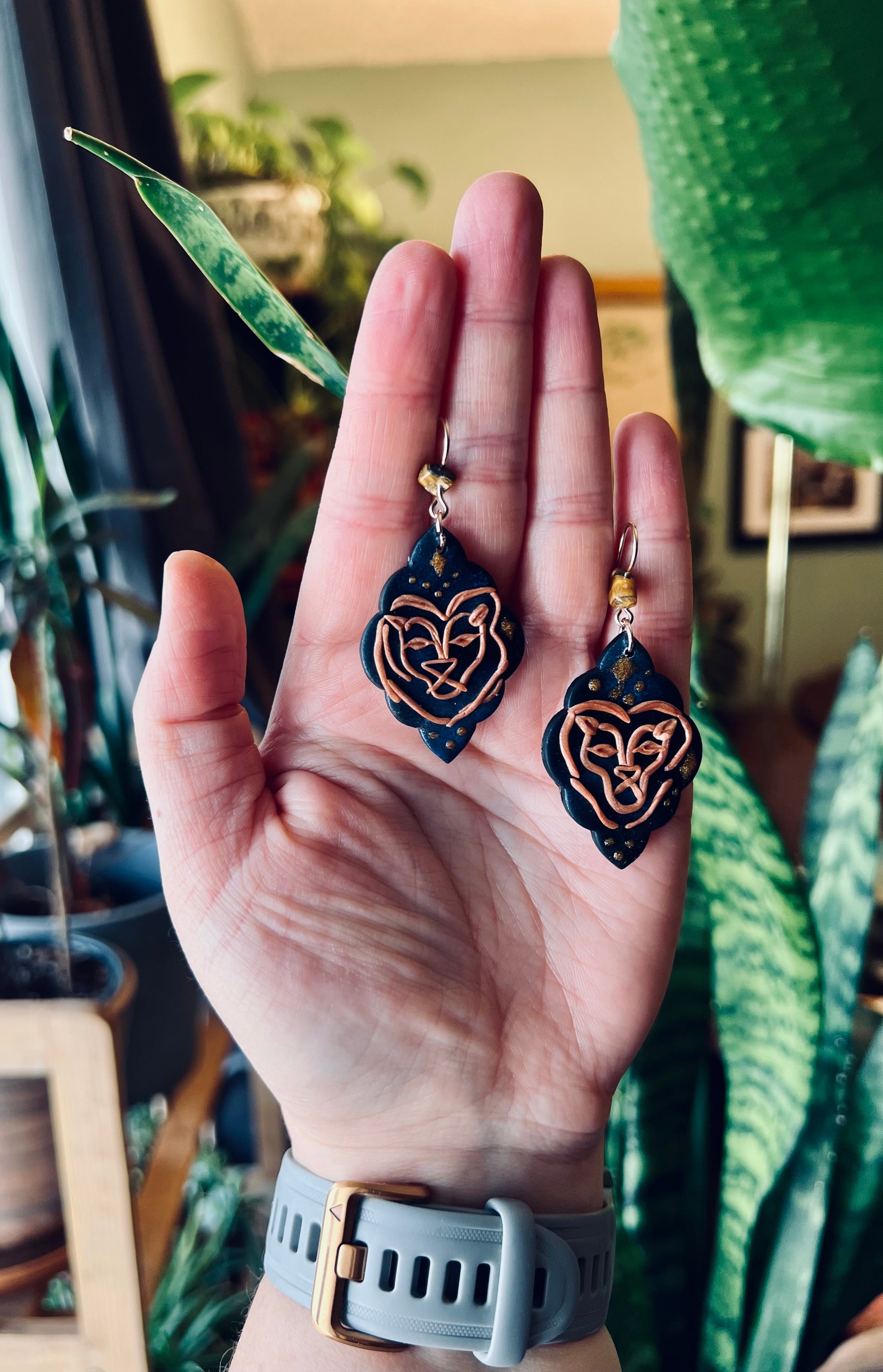 Regal Leo earrings symbolizing strength and confidence, crafted with exquisite detail. These artisanal pieces reflect the lion's courage and leadership, perfect for those born under the Leo sign. Embrace your inner lion with these majestic earrings. Shop now and command attention with your Leo pride!