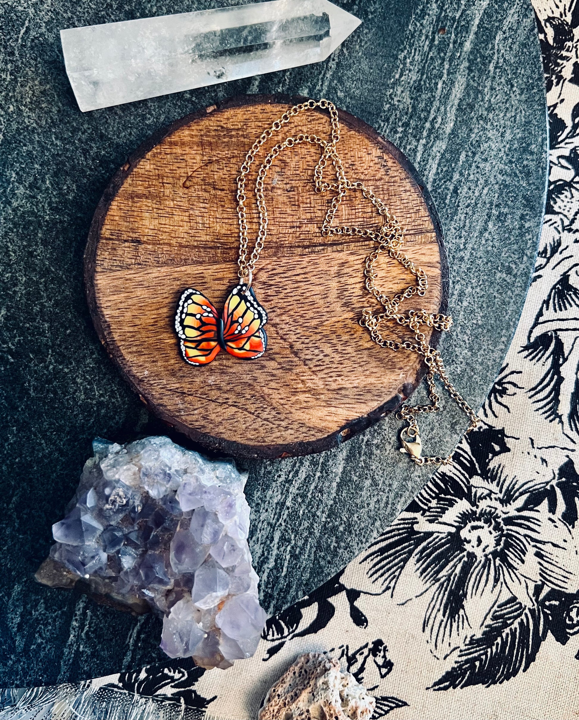 Channel the strength of the monarch butterfly with our handmade polymer clay necklace. Crafted using the Cane technique, each pair embodies the spirit of transformation and renewal