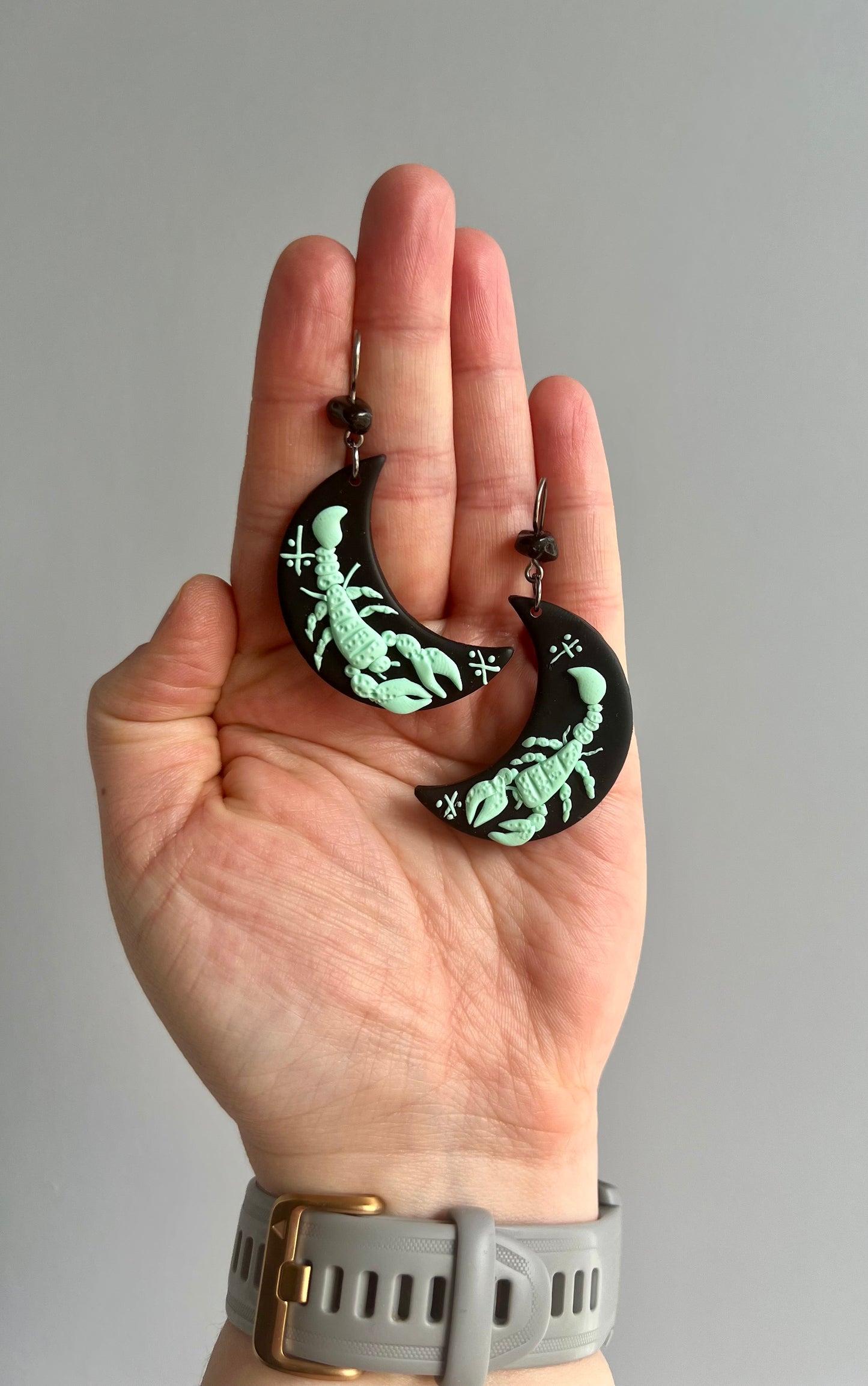 Handcrafted polymer clay Scorpio earrings, perfect for astrology lovers. These unique earrings feature intricate Scorpio zodiac sign designs, adding a touch of personality to any outfit. Shop now for a stylish accessory that celebrates your astrological sign!