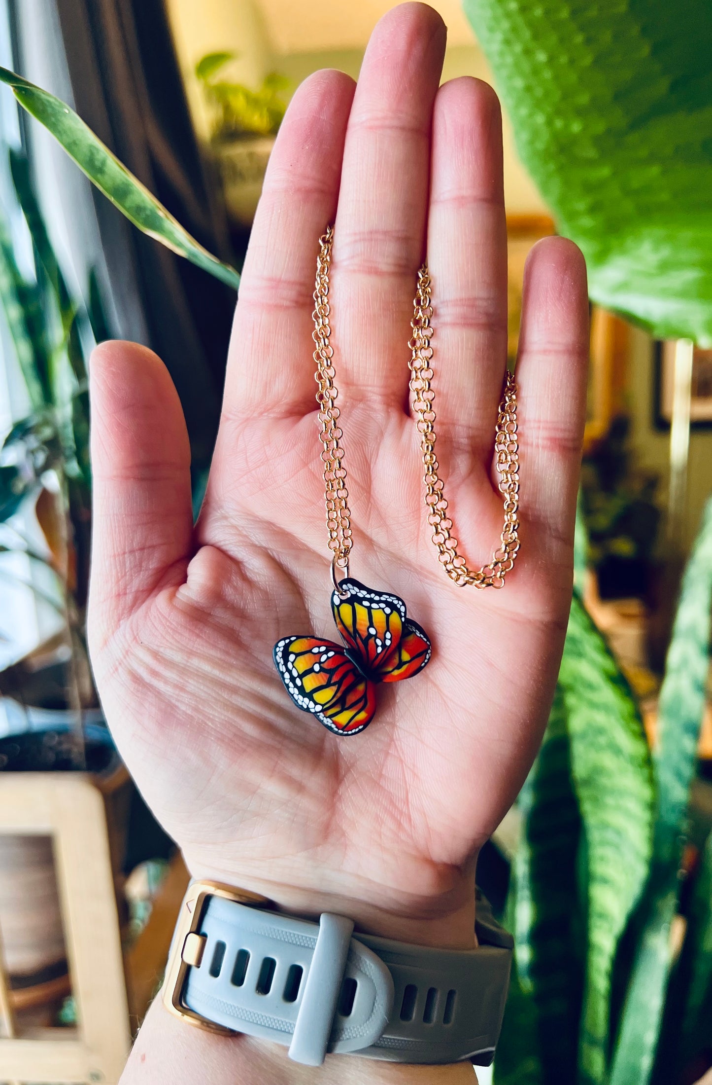 Discover the cultural significance of the monarch butterfly with our polymer clay necklace. In Aztec tradition, these butterflies symbolize the souls of ancestors, embodying strength and resilience.