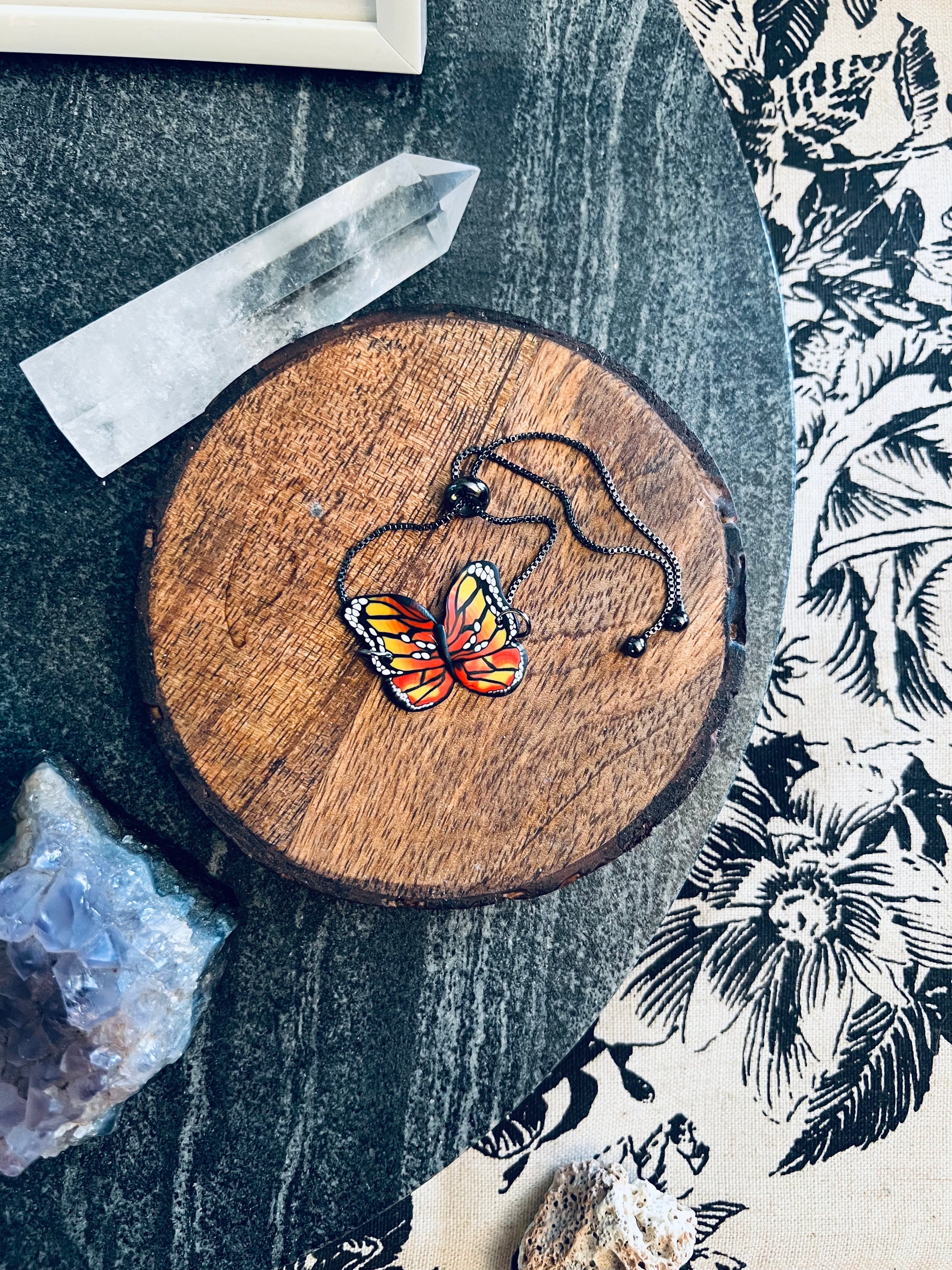 Embrace the symbolism of the monarch butterfly with our handmade polymer clay bracelet. Representing strength and transformation, this bracelet capture the beauty of rebirth and hope.