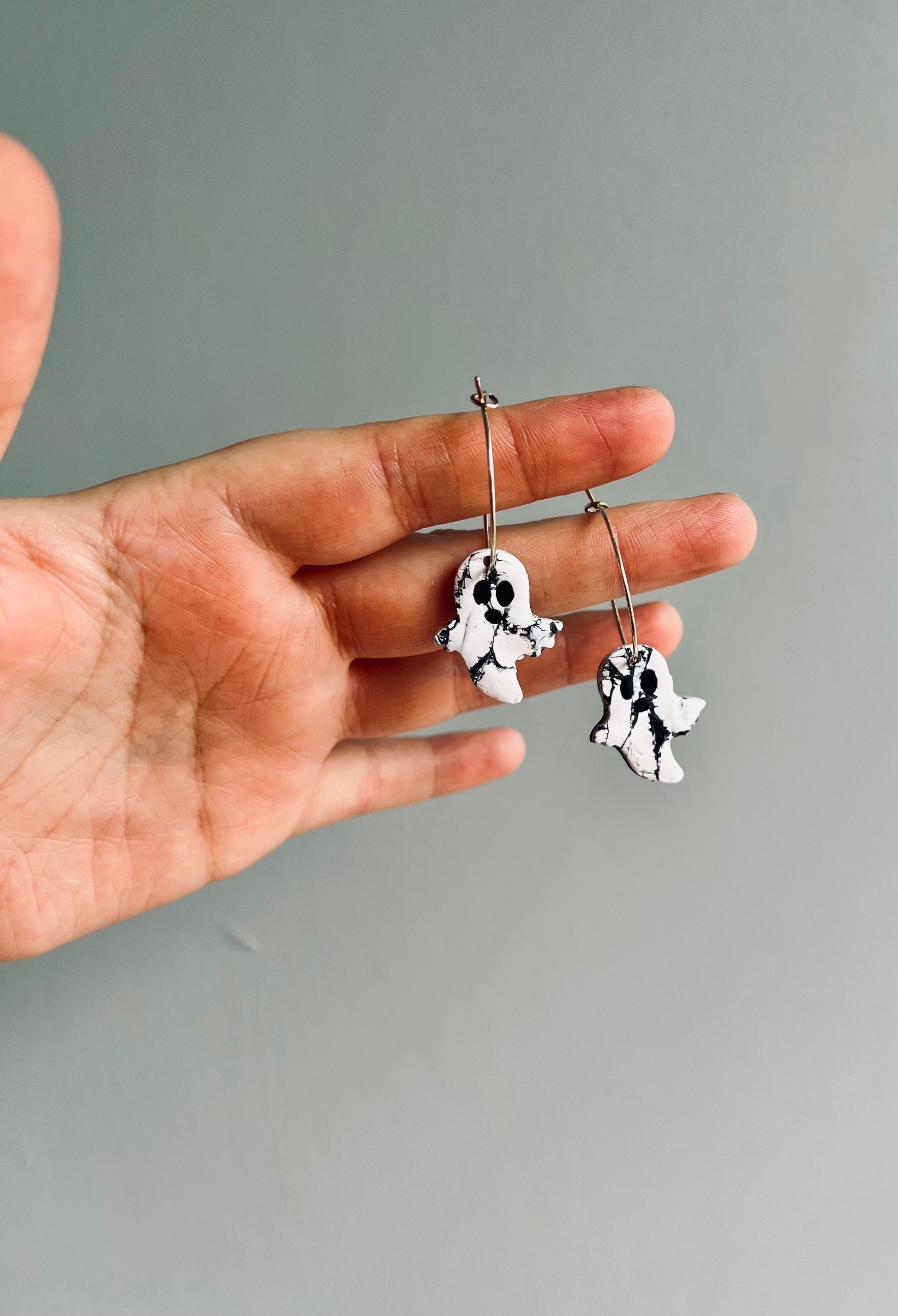 Get into the spooky season with our adorable polymer clay ghost earrings, perfect for any ghostly occasion.