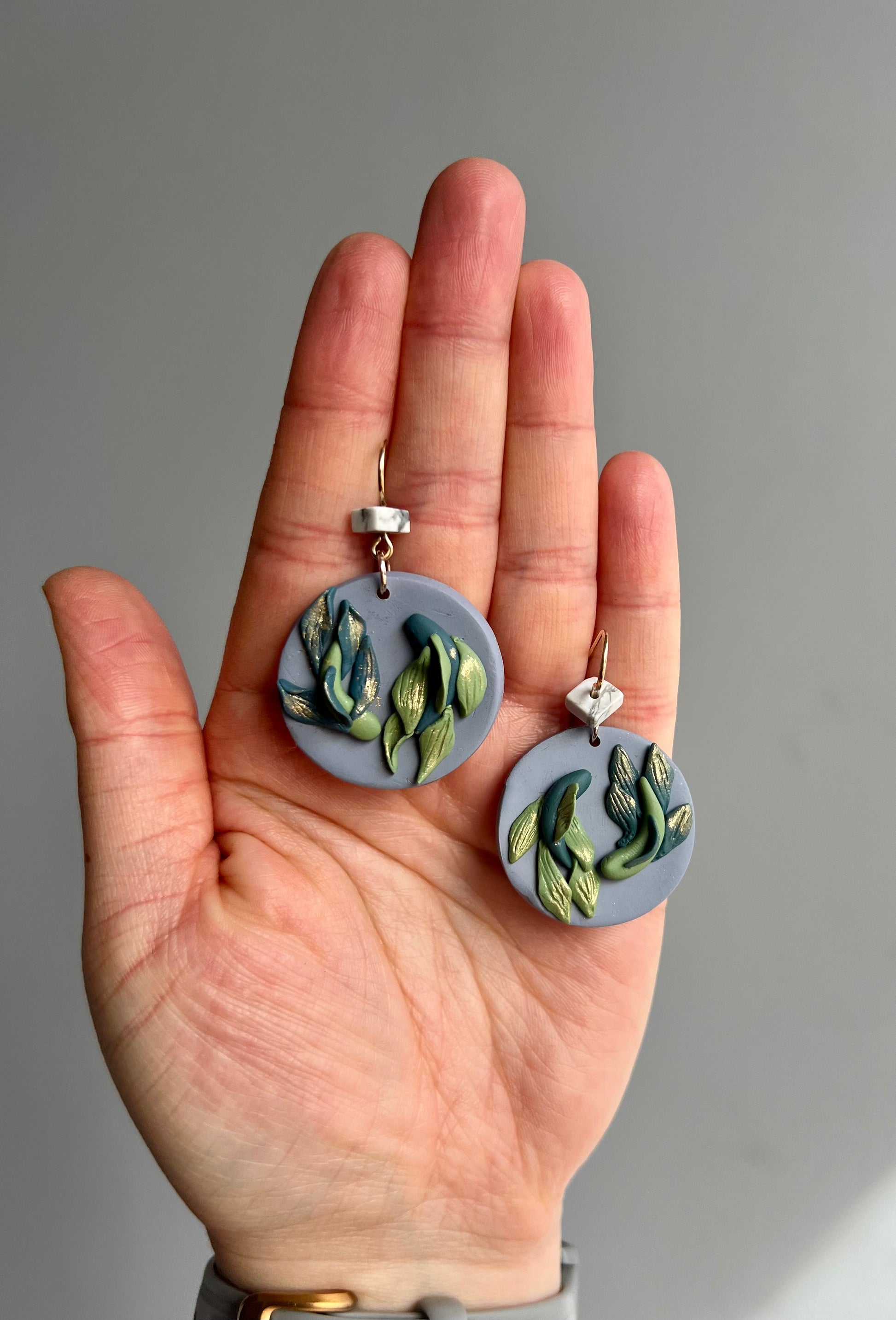 Stunning polymer clay Pisces earrings featuring exquisite Howlite accents. Handcrafted with care, these earrings embody the fluidity and intuition of the Piscean spirit. Elevate your style with this unique blend of artistry and gemstone energy. Shop now and embrace your Pisces identity!