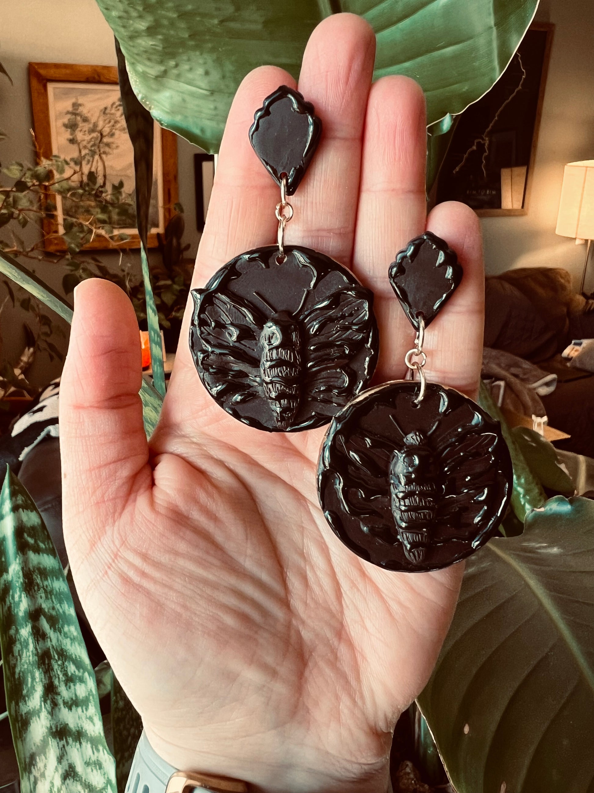 Capture witchy vibes with our brown death moth earrings, evoking mystery and transformation. These Gothic-inspired accessories add an enchanting touch to your look, perfect for those who resonate with the darker side of life.