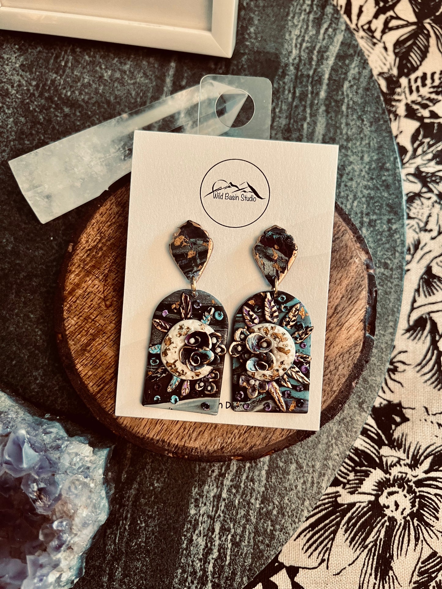 Celebrate the Flower Moon with these handcrafted earrings. Made with kato polymer clay, each intricate floral design symbolizes new growth and blooming. Nickel-free and hypoallergenic posts ensure comfort and style.