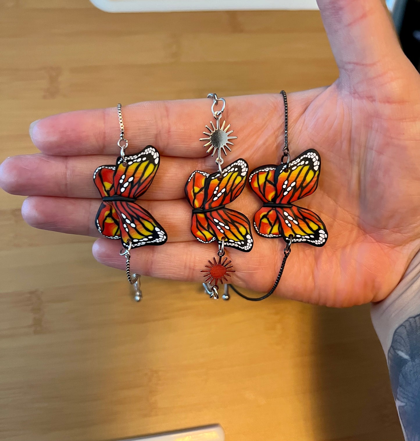 Experience the beauty of rebirth with our polymer clay bracelets featuring the monarch butterfly design. Handcrafted using the Cane technique, these earrings symbolize hope and resilience in the face of transformation.