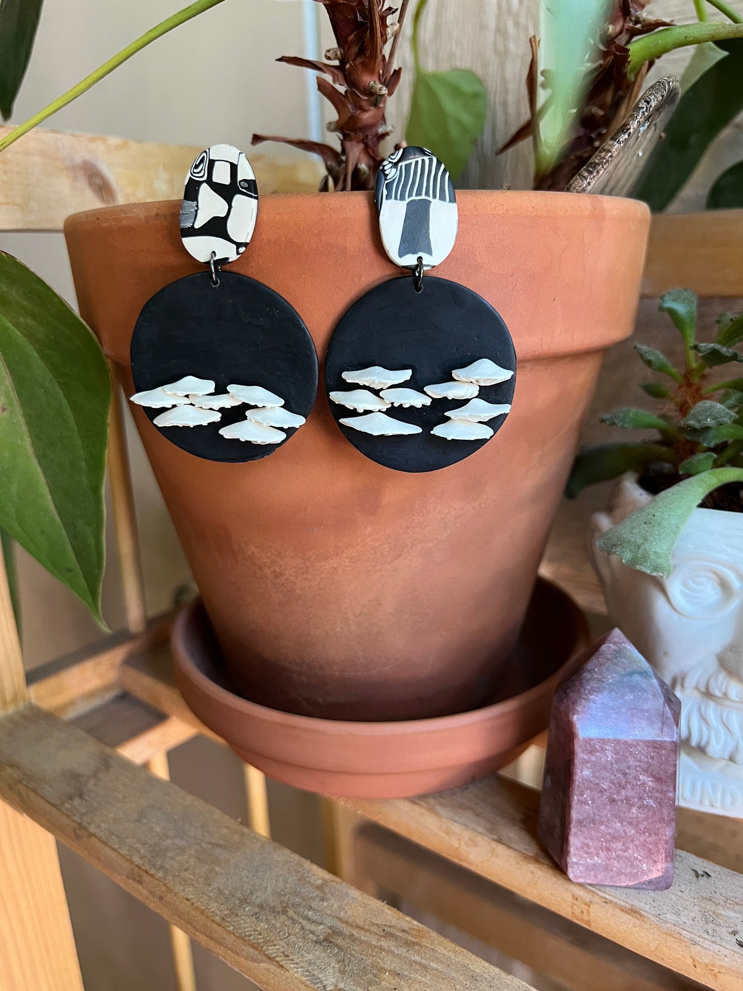 nfuse your style with natural charm wearing our polymer clay chicken of the woods mushroom earrings. These whimsical accessories capture the beauty of nature, adding a playful touch to any outfit. Embrace organic elegance with these unique statement earrings.
