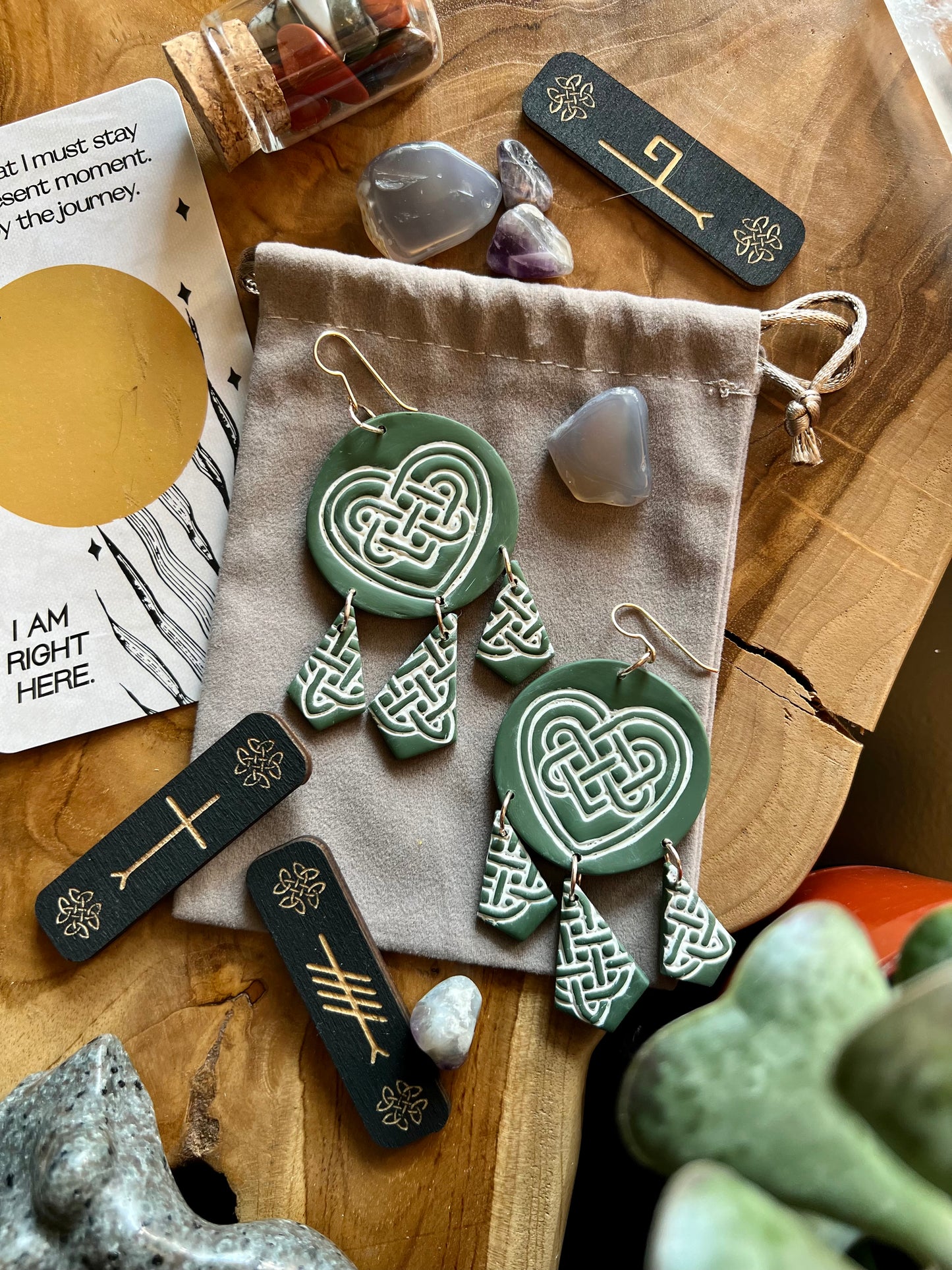 Add a touch of Celtic charm to your ensemble with our green polymer clay earrings featuring a love knot design. Symbolizing eternal love and connection, these earrings exude timeless elegance. Make a statement with these exquisite accessories, perfect for expressing your affection and style.