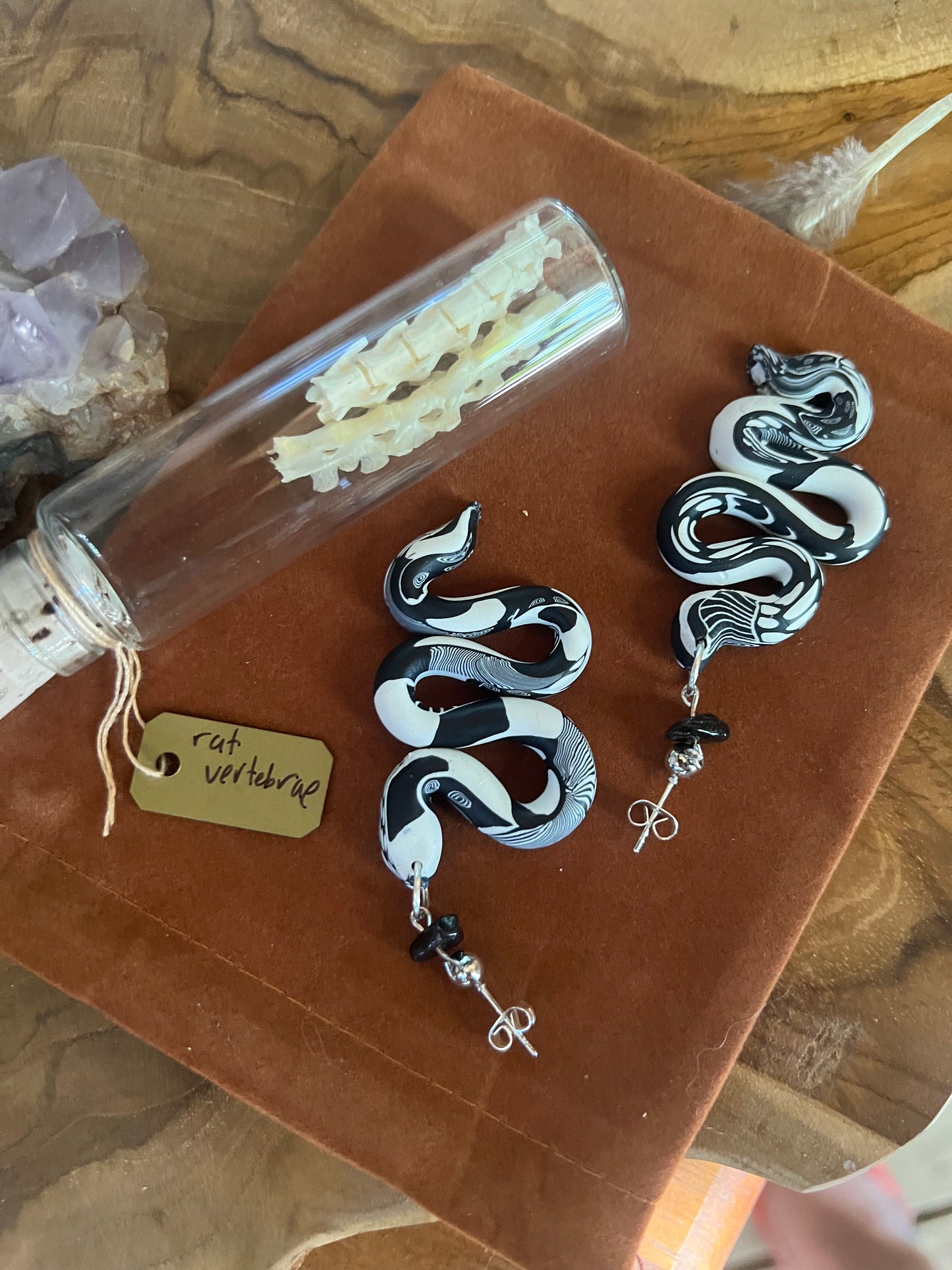 Embrace the symbolism of transformation and renewal with our snake earrings. These earrings embody the serpent's power, representing cycles of shedding old skin and embracing new beginnings. Perfect for those seeking to embrace change and personal growth in their style.