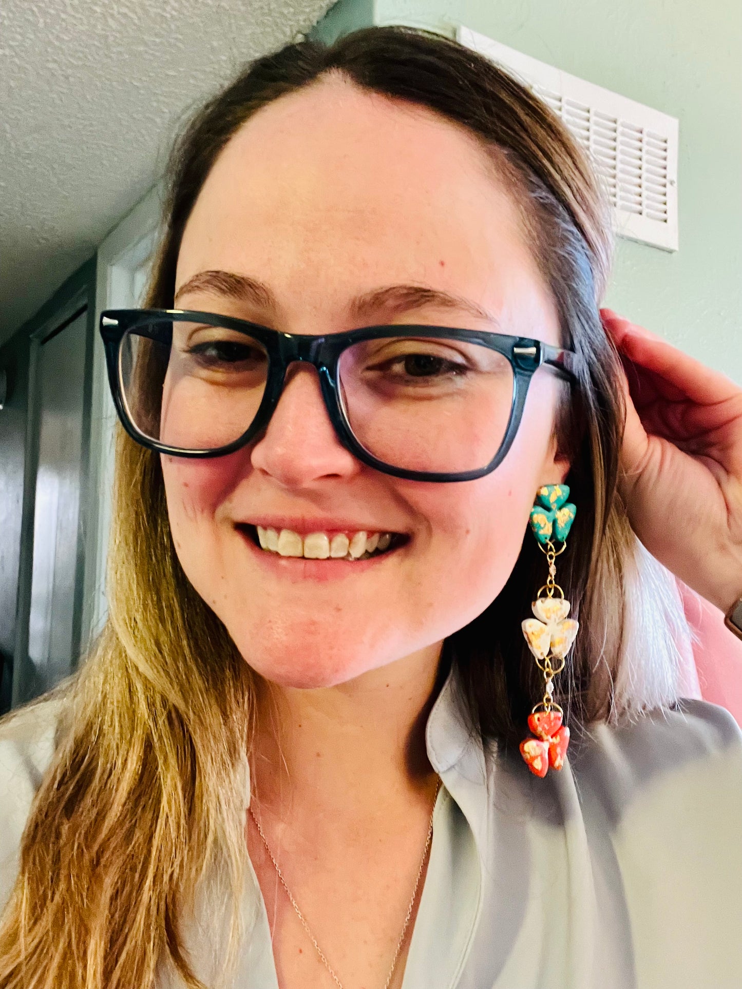 Celebrate St. Patrick's Day in style with our handmade polymer clay shamrock earrings, reflecting the colors of the Irish flag.