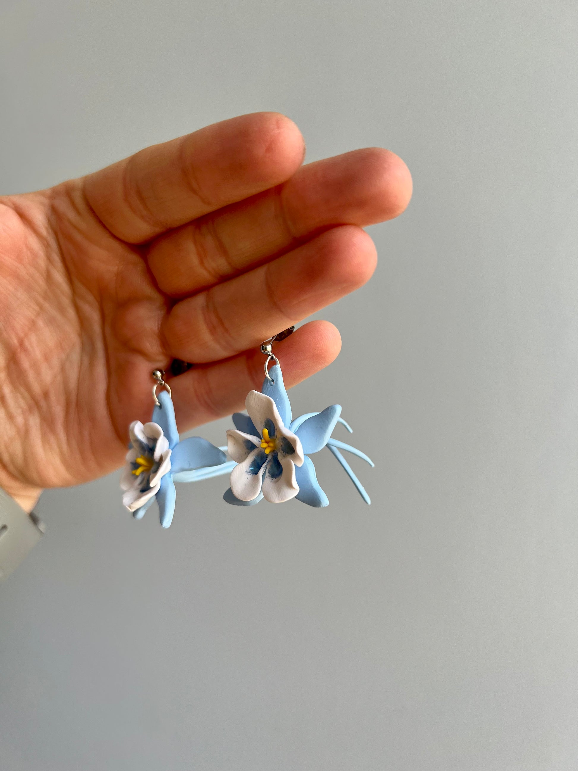 Embrace the beauty of Colorado's wildflowers with our columbine earrings, inspired by the state's iconic symbol. Add a touch of natural elegance to your ensemble with these charming accessories.