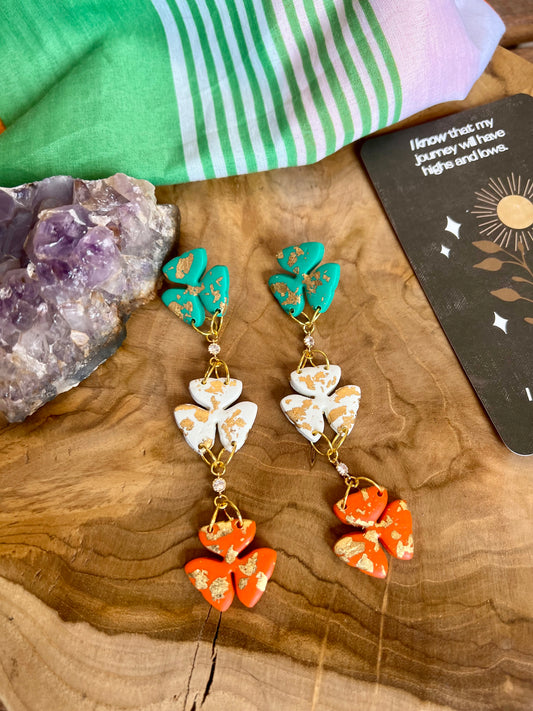 Add a touch of Irish charm to your ensemble with our vibrant polymer clay shamrock earrings, perfect for St. Patrick's Day festivities
