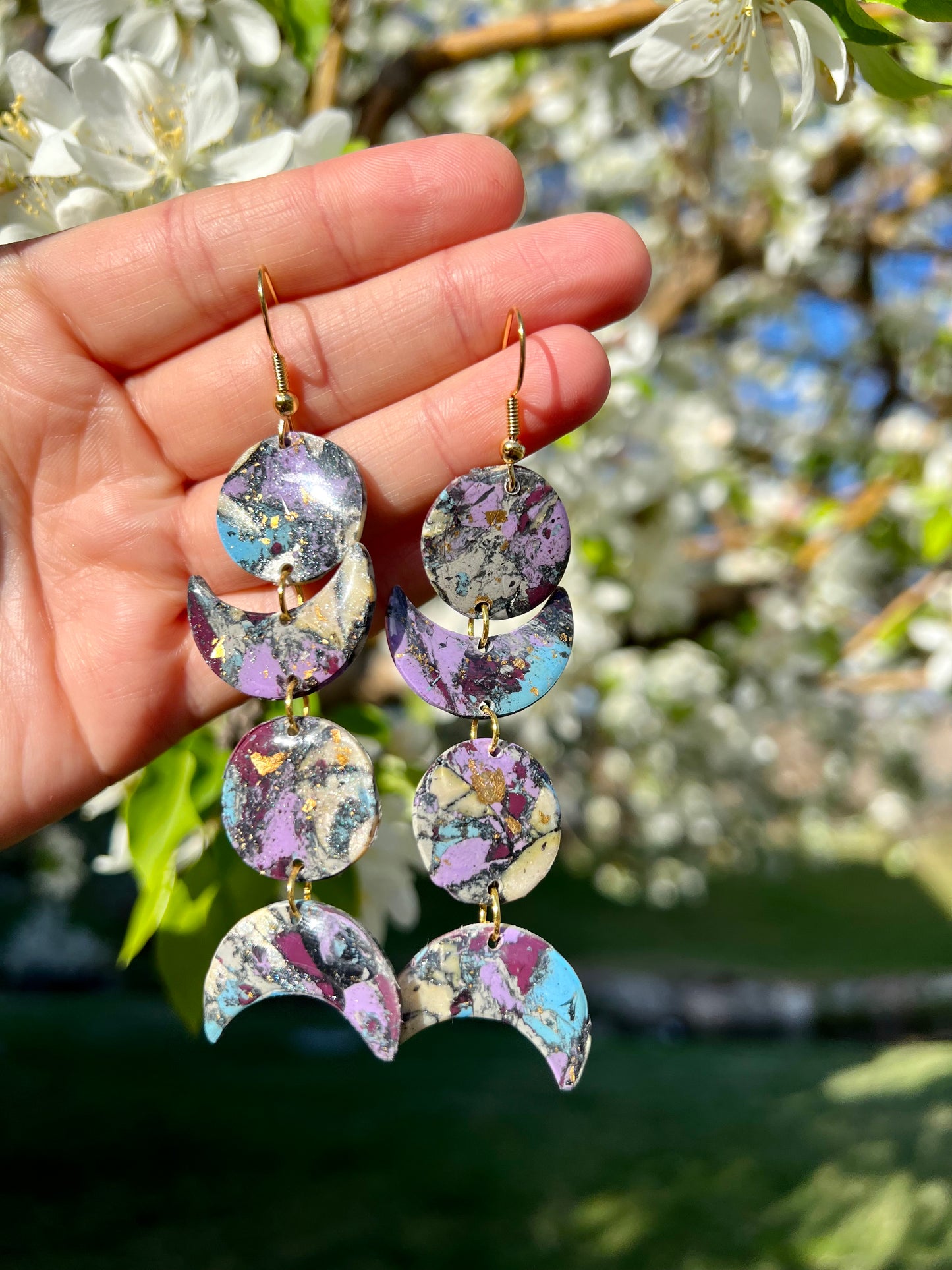 Experience the symbolism of life's rhythm and feminine power with these earrings. New Moons herald new chapters, while waning crescents encourage the manifestation of dreams and aspirations