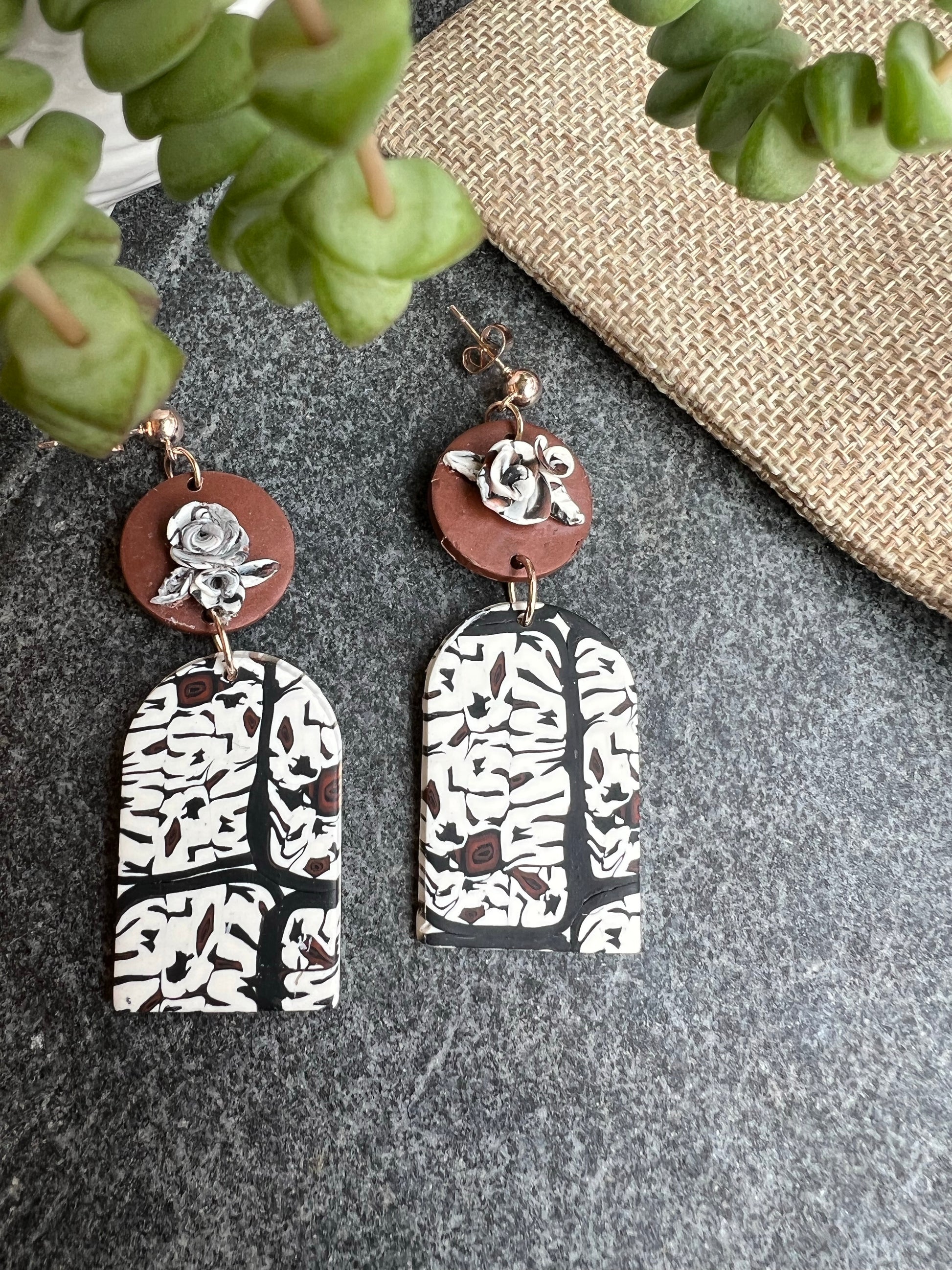 Complete our look with our Colorado Aspen inspired polymer clay earrings, featuring hand-sculpted roses. These intricately crafted accessories embody the resilience of Aspen trees, while the delicate roses add a touch of elegance.